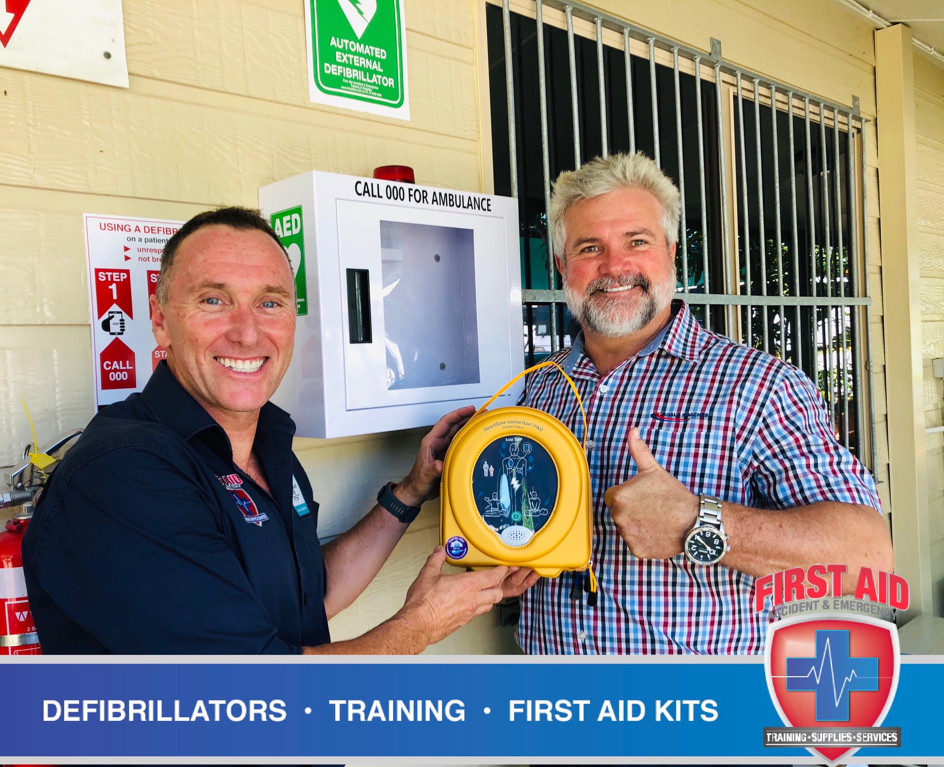 Bede Young and Scott Whimpey with new HeartSine 360p Defibrillator at Koala Coaches