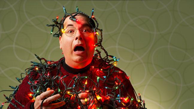 Christmas Lights wrapped around a man