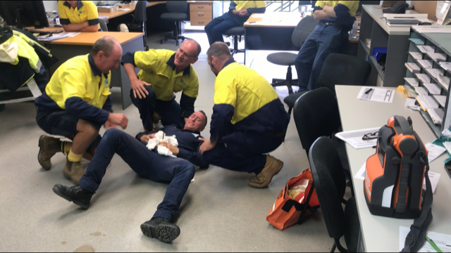 Simulation of a medical emergency in a trade workplace